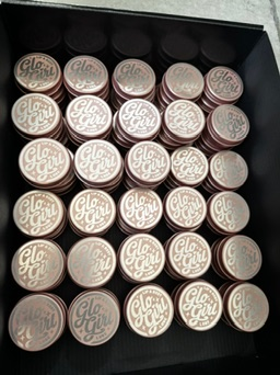 Glo Girl tins arranged for hand-finishing in our Austin studio.